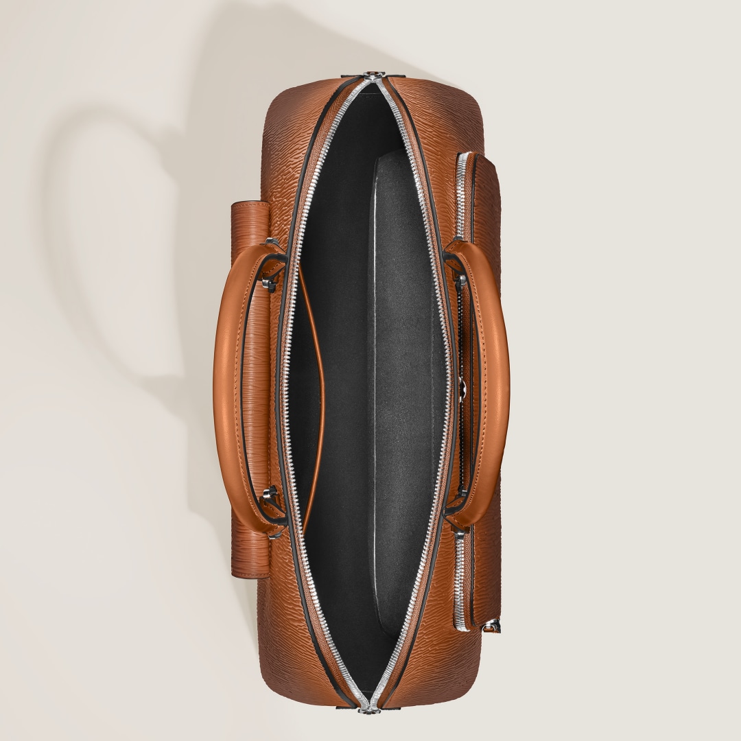 코르테치아 스푸마토 라이팅 트래블러 핸드백