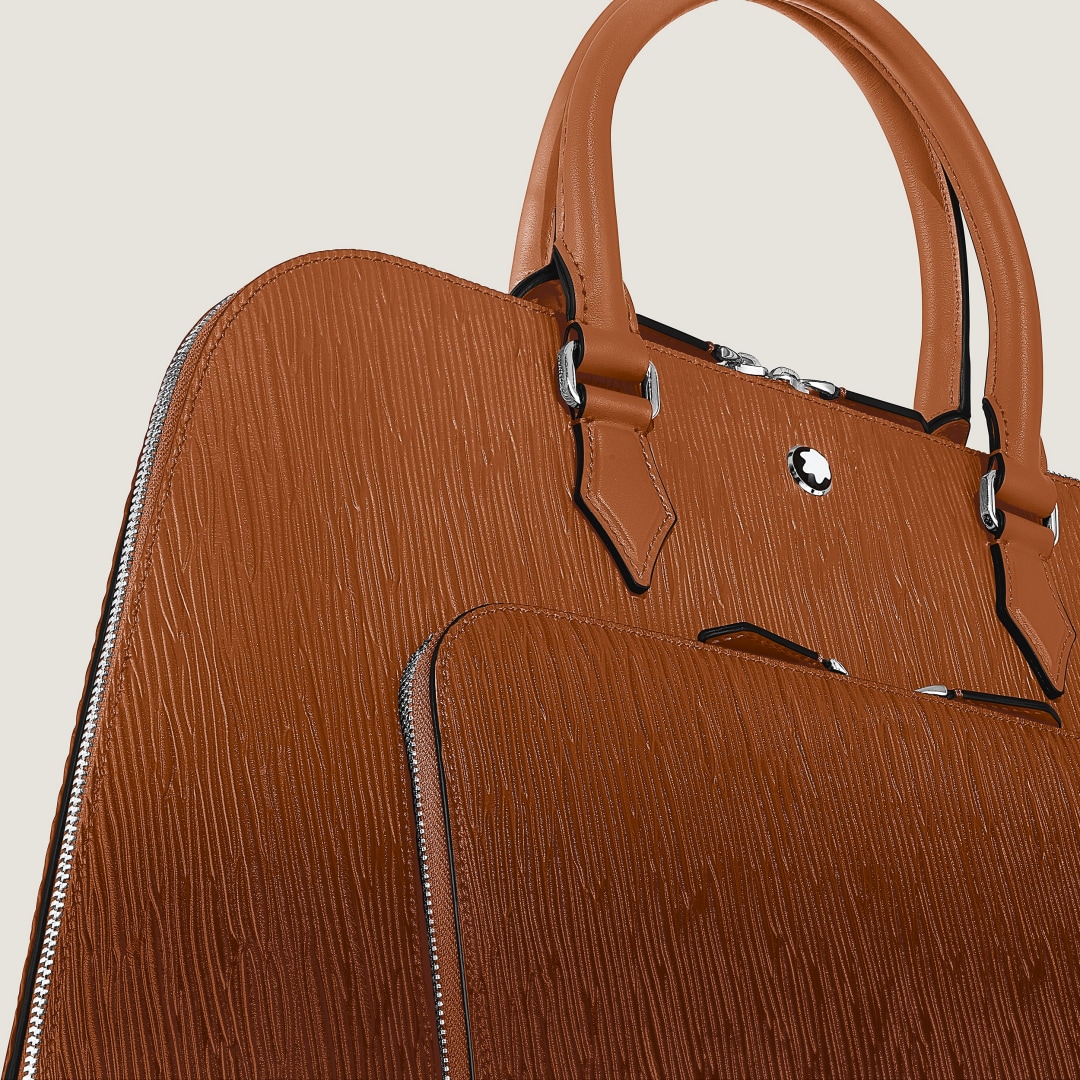 코르테치아 스푸마토 라이팅 트래블러 핸드백